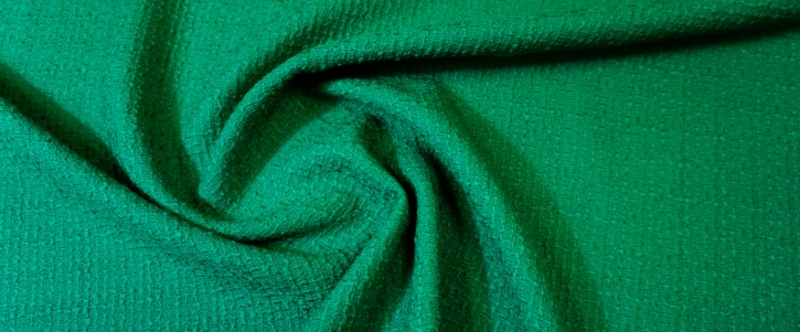 Schurwollboucle - smaragdgrün