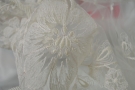 remnants, French lace-flowers, ivory